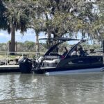 Pontoon boat at a waterfront dock in Palm Coast, Florida